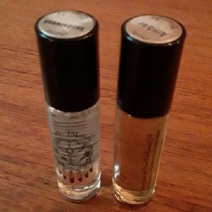 Auric Blends Amber and Sandalwood Rollerball fragrances